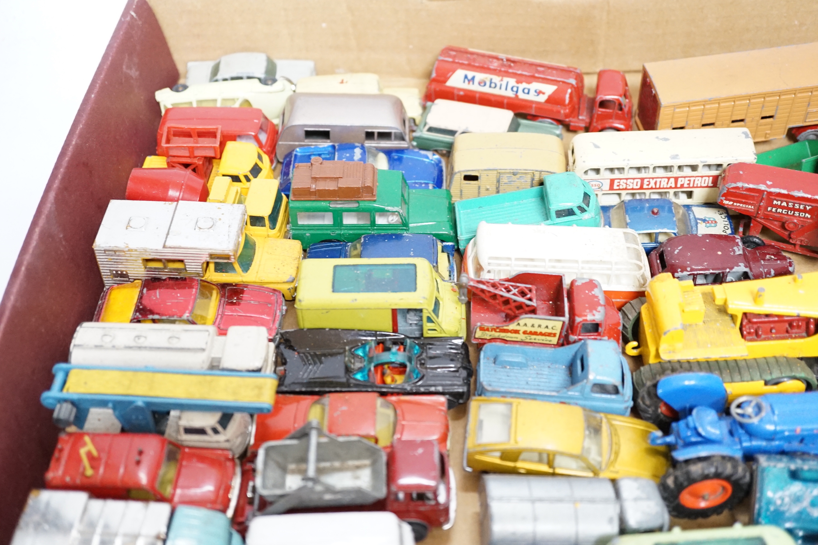 A collection of diecast vehicles by Corgi Toys, Dinky, Spot-On, Matchbox, etc. including 38, corgi toys; a Batmobile, a gold James Bond Aston Martin, a Man From UNCLE Oldsmobile, etc. 18 Husky Toys, ten Dinky Toys, etc.